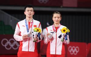 Zheng Si Wei/Huang Ya Qiong (Tiongkok) berhasil meraih medali perak Olimpiade Tokyo 2020. (Foto: BADMINTONPHOTO - Yves Lacroix)