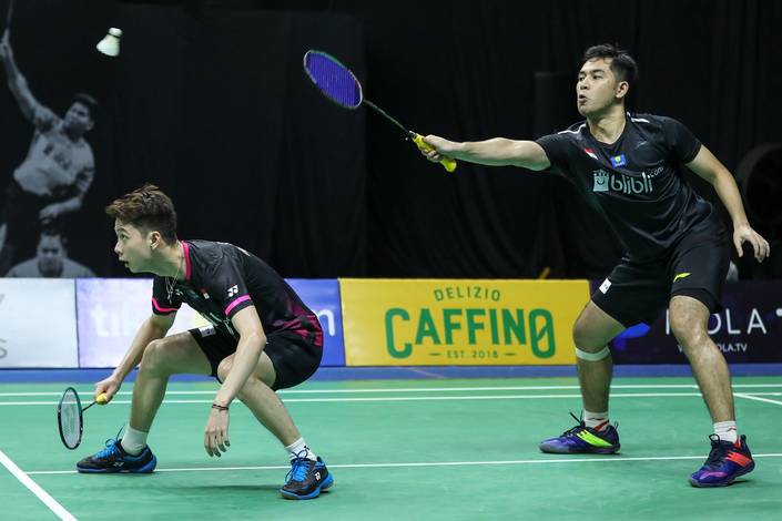 Kevin Sanjaya Sukamuljo/Moh. Reza Pahlevi Isfahani mengembalikan shuttlecock. Kevin Sanjaya Sukamuljo/Moh. Reza Pahlevi Isfahani mengembalikan shuttlecock.