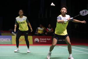 Muhammad Zilazik Artando Zakaria/Afizzah Rahmadhani (Djarum Badminton/Edward Luhukay)
