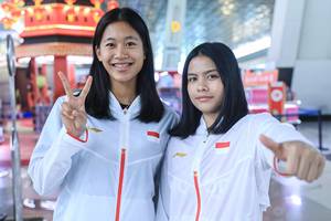 Putri Kusuma Wardani & Komang Ayu Cahya Dewi (Humas PP PBSI)